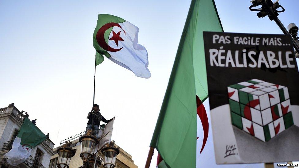 Banner and flags at a protest