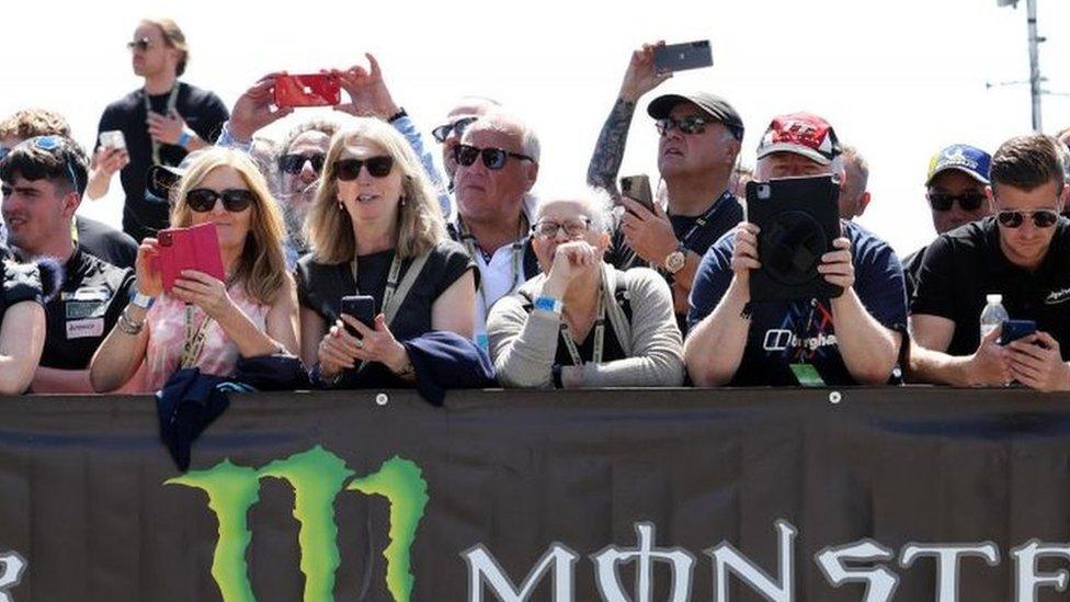 Fans at the start of a race at the grandstand