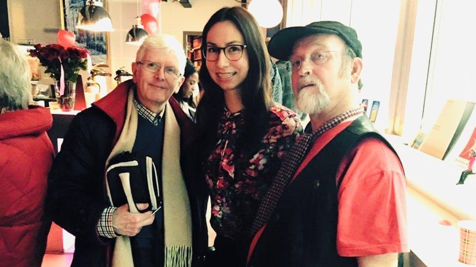 Danielle Smissaert with two elderly men