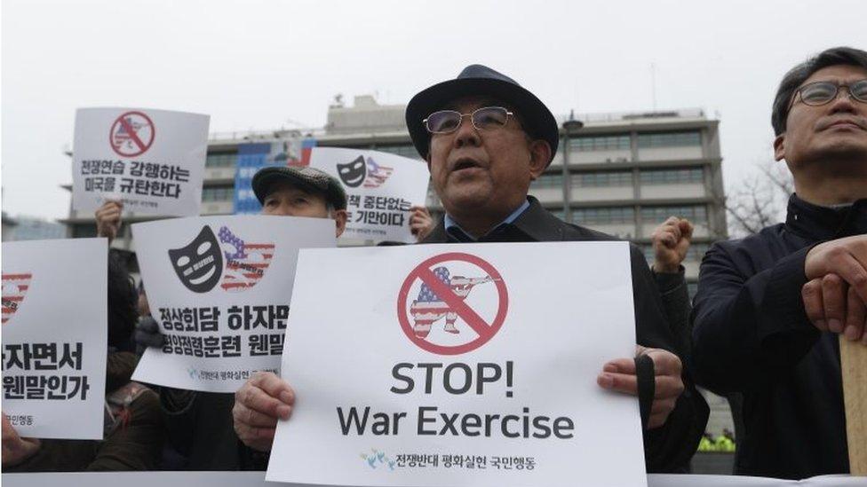 South Korean protesters hold banners reading "Stop War Exercises" during a rally against South Korea and US military forces joint "Key-Resolve / Foal Eagle" military exercises near the US embassy in Seoul, South Korea, 21 March 2018