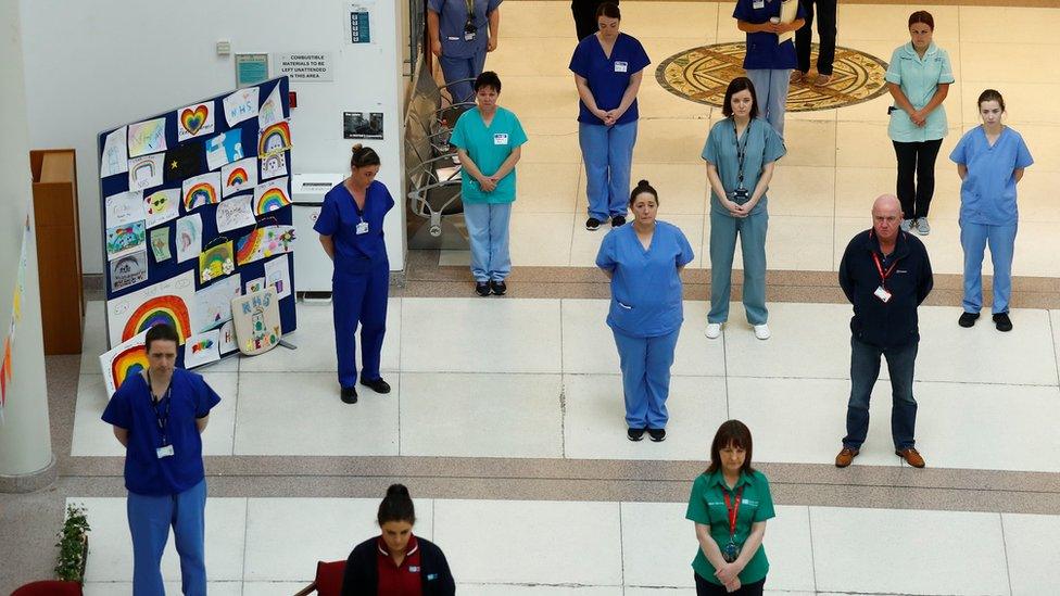 Staff at Belfast's Mater Hospital observe the minute's silence