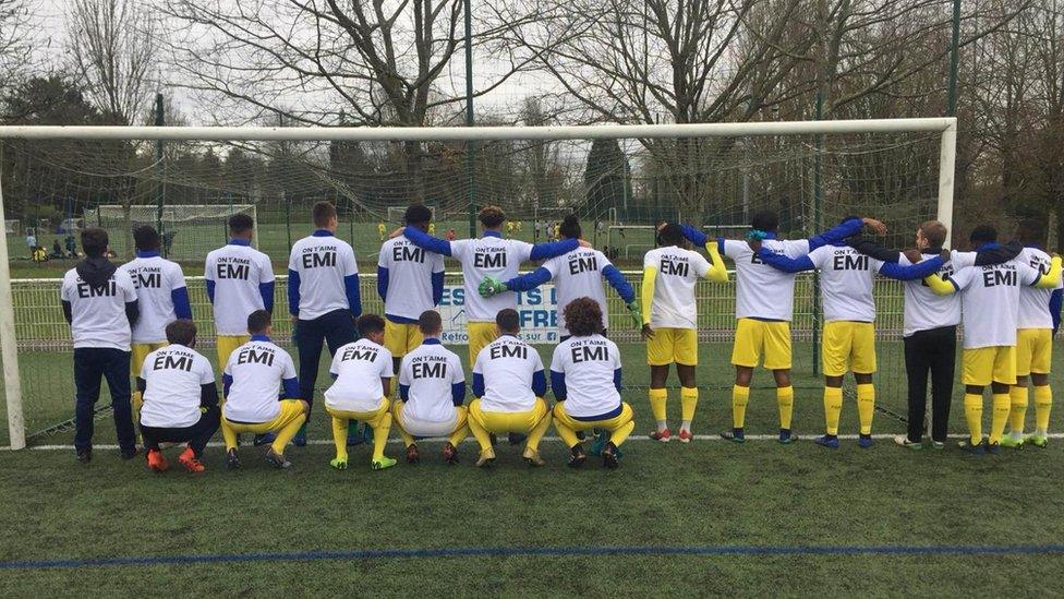 The under-19s at FC Nantes pose for pictures - wearing t-shirts with the words 'We Love You Emi'