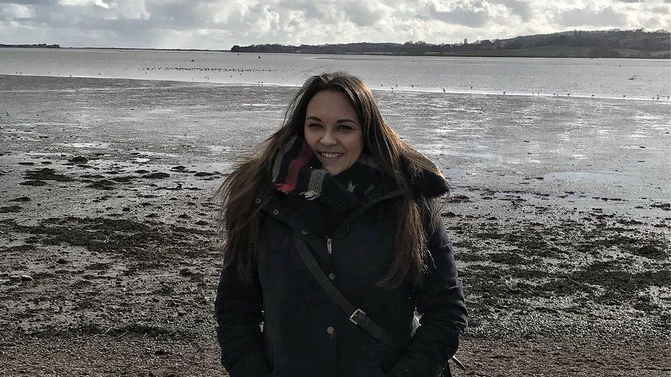 Lydia Vowden on a beach