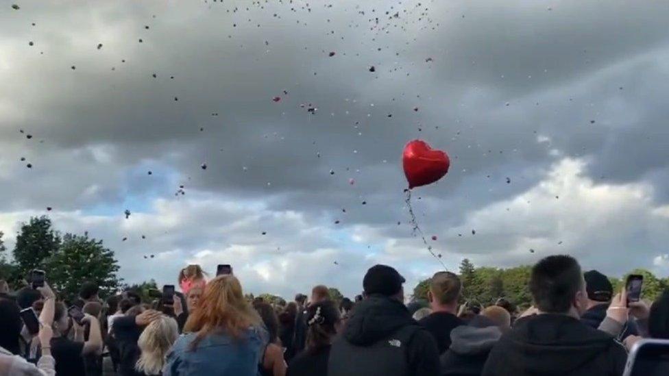 Balloons being released