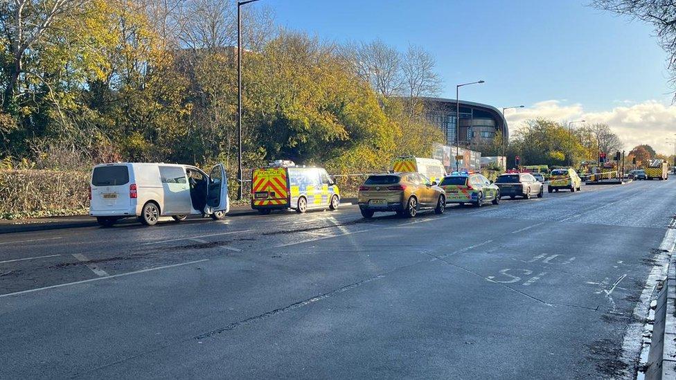 Ambulance and other emergency vehicles at the scene of a crash