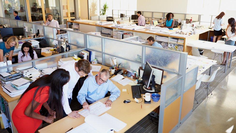 workers in open-plan office