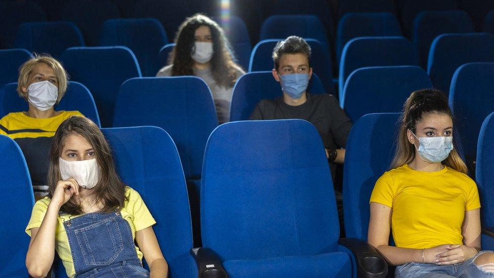 people-wearing-face-masks-in-audience