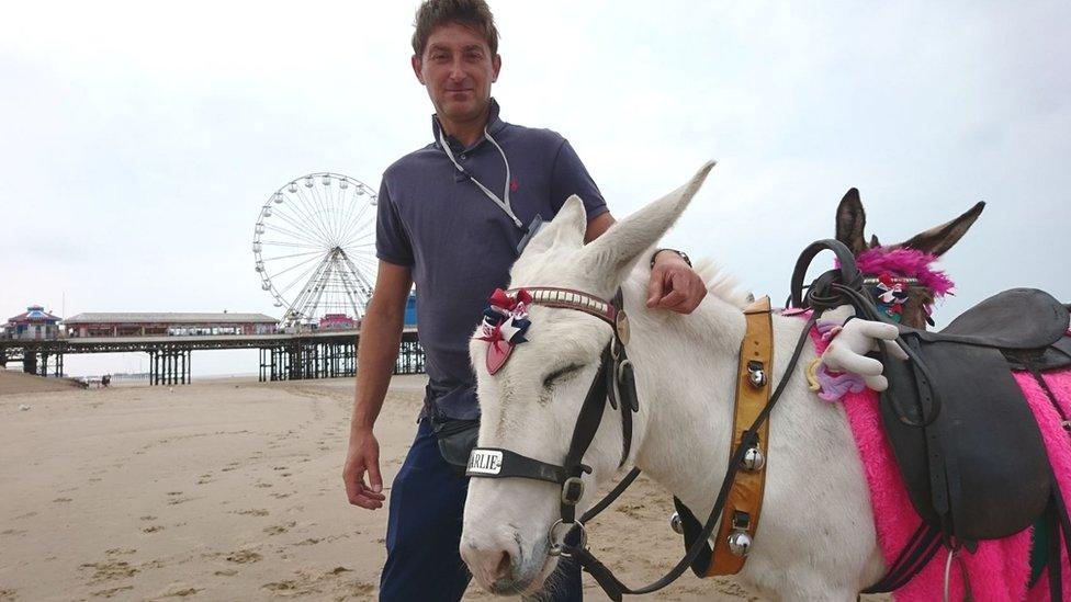 Jake Radford and donkey Charlie on Blackpool beach