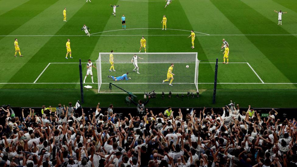Tottenham Hotspur's Brennan Johnson scores his team's first goal past Bodo/Glimt's Nikita Haikin during the UEFA Europa League 2024/25 Semi Final First Leg match