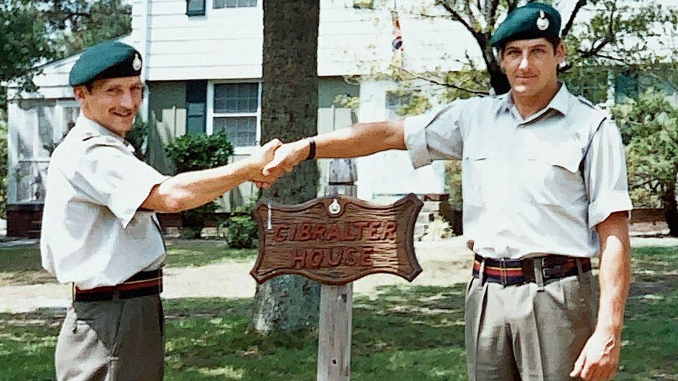 Royal Marines Joe House and Jonathan Lear pictured shaking hands at Camp Lejeune in the 1980s