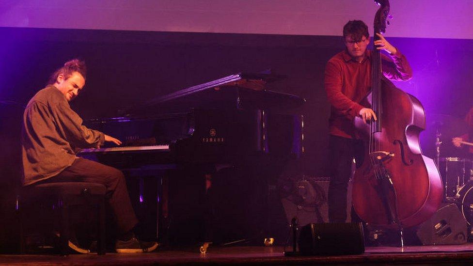 Fergus McCreadie (left) performs on stage