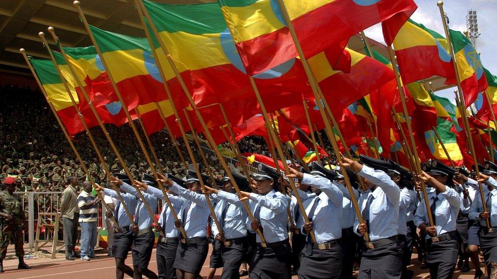 People marching with Ethiopia's flag on flag day