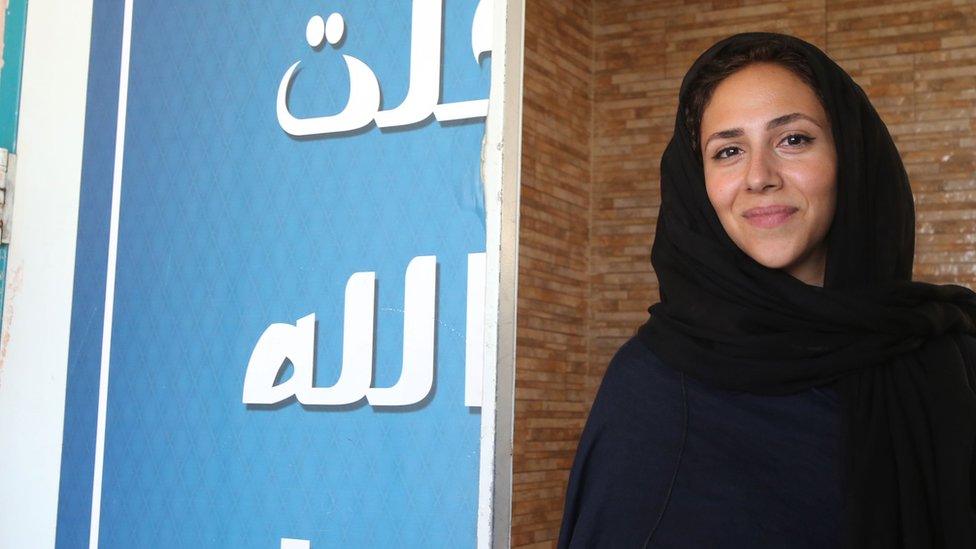 Woman arriving at a polling station in Jeddah