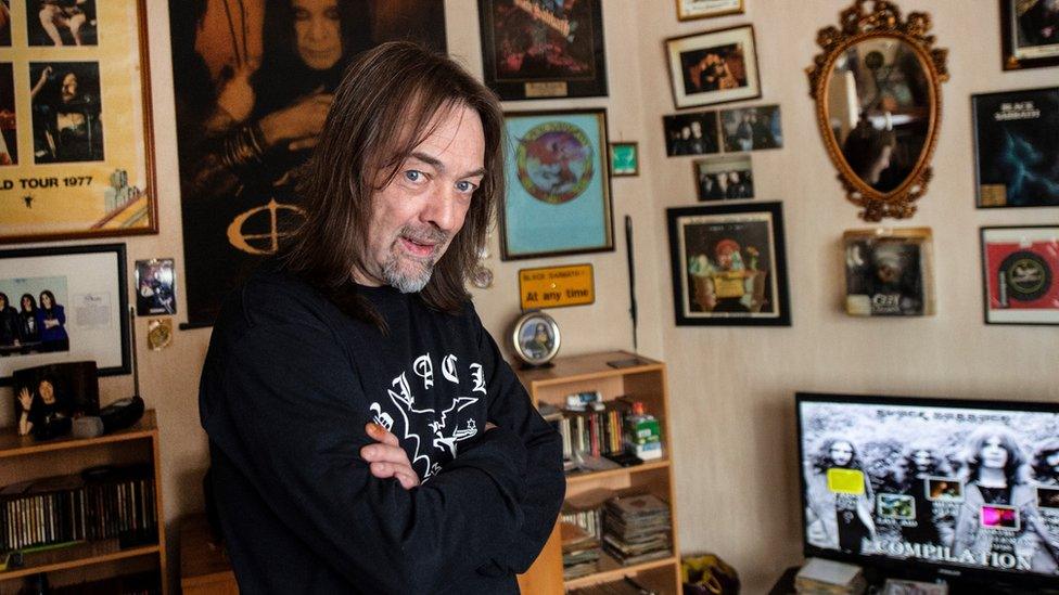 Stephen Knowles in his living room devoted to Black Sabbath