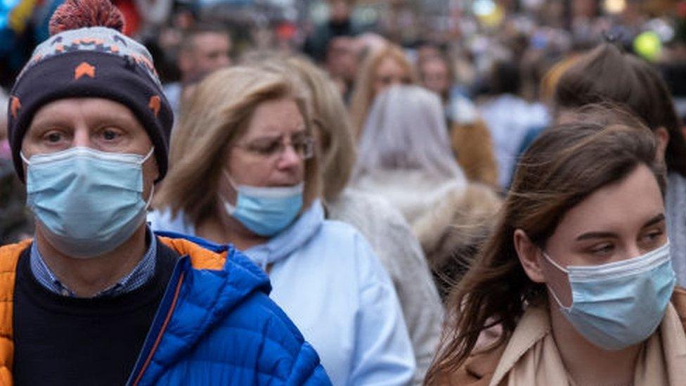 Shoppers in masks