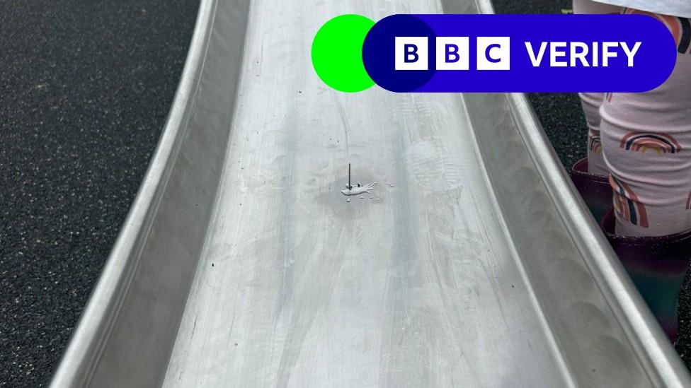 A nail glued to a playground slide