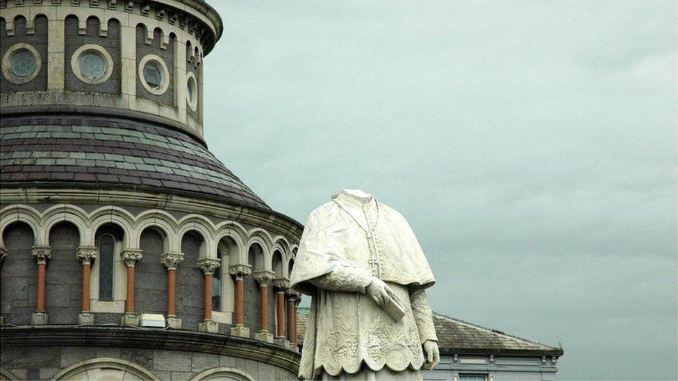 Decapitated statue of Archbishop Patrick Leahy outside the Cathedral.