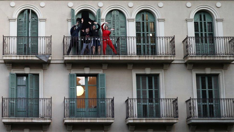 women on their Barcelona balcony