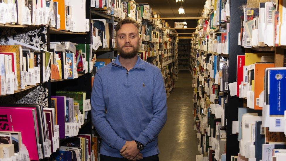 Ben Wadsworth, marketing manager at WeBuyBooks in their warehouse in Waterfoot, Rossendale.