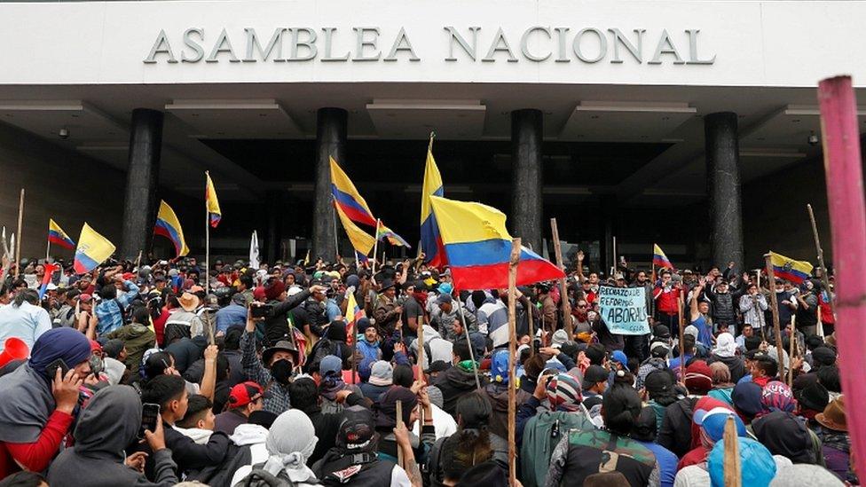 Demonstrators gather outside the National Assembly building, in Quito, Ecuador, October 8, 2019