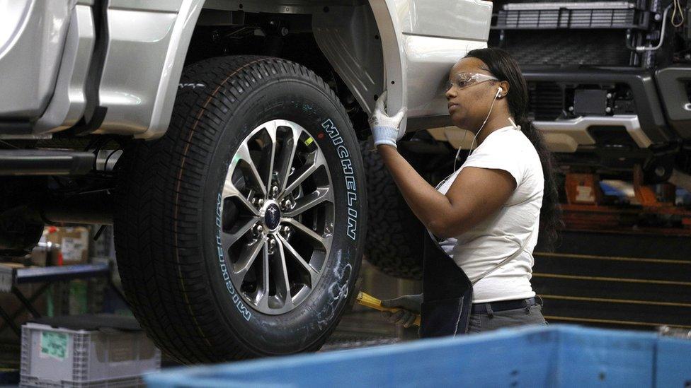 A worker at a Ford factory in Michigan