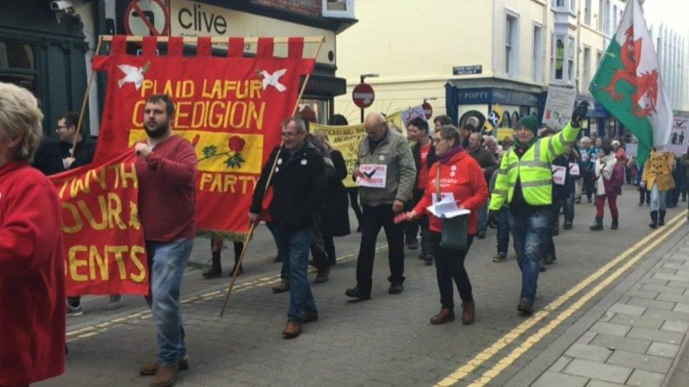 About 150 people attended a march in protest of the council's plans to close the home