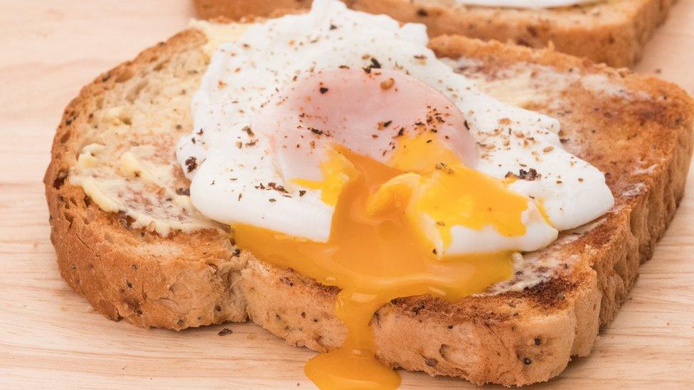 A fried egg on a piece of wholemeal toast