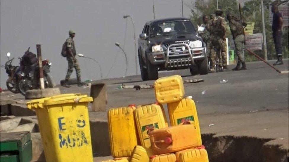 A still image from video of soldiers who have taken control of Bouake standing at a checkpoint in Bouake, Ivory Coast January 6, 2017