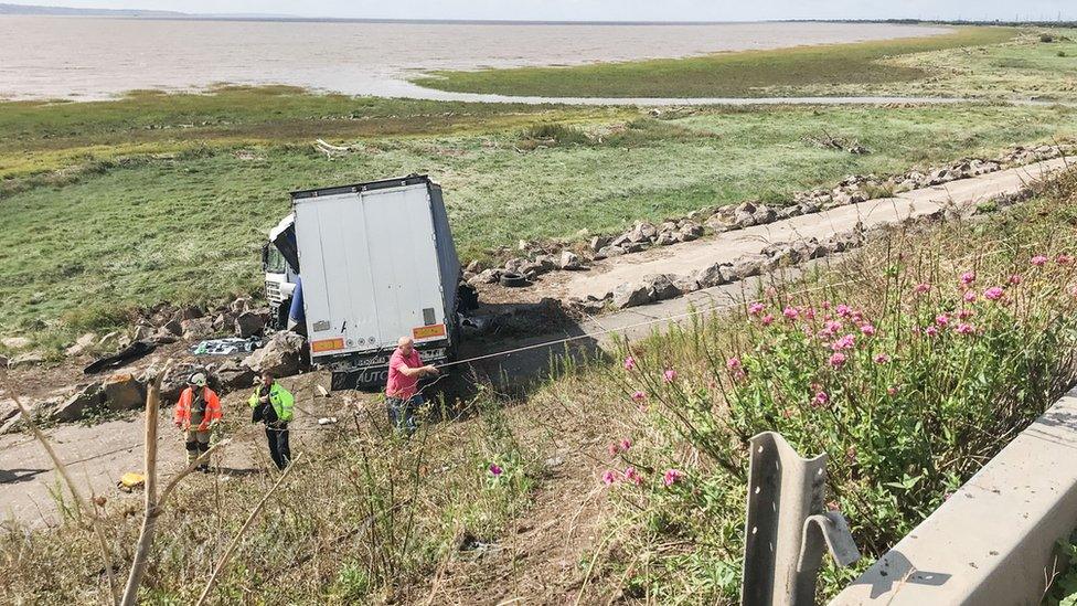 The lorry down crashed the embankment