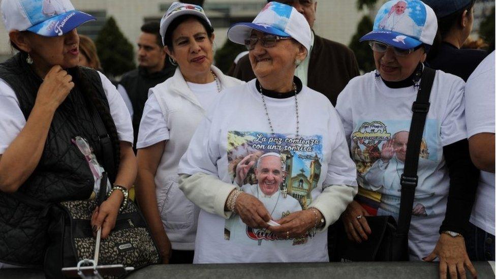 The faithful wait for the arrival of Pope Francis in Bogotá, Colombia, September 6, 2017