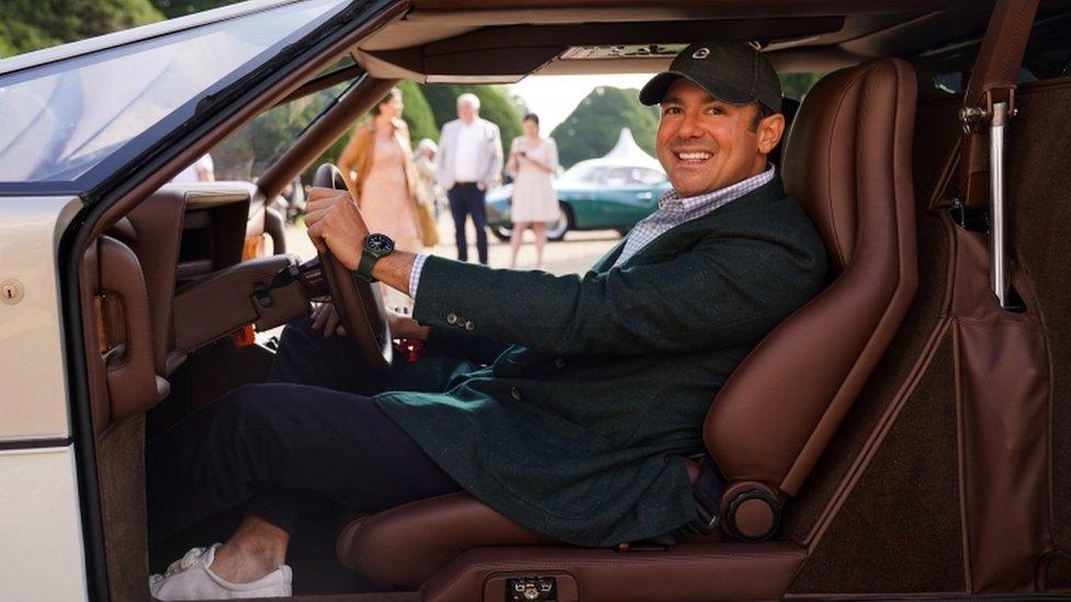 Owner Phillip Sarofim sits in his Aston Martin Bulldog supercar