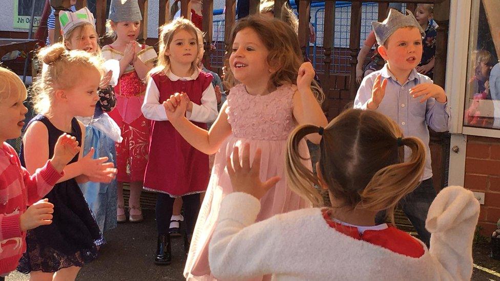 Pupils at Ysgol y Llan Whitford enjoy belated birthday party