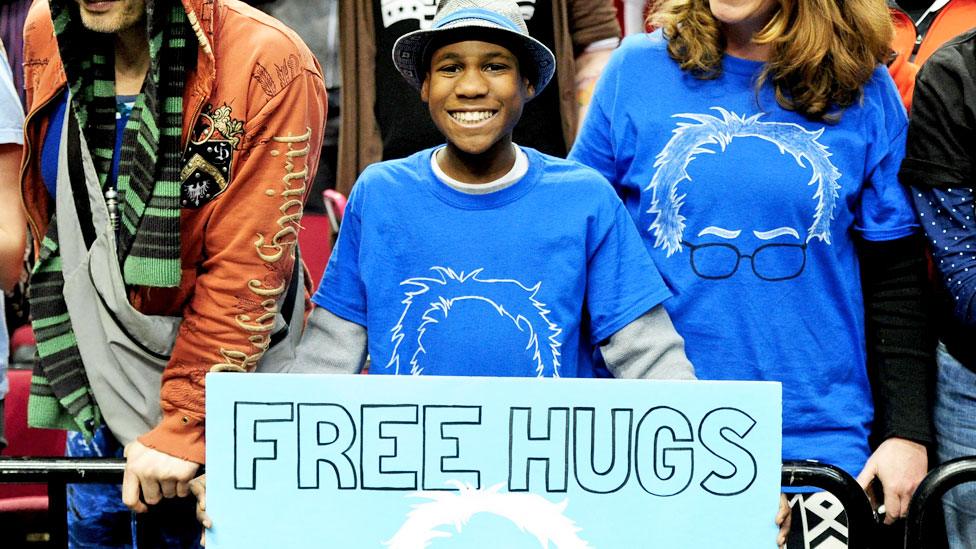 Devonte Hart holds a sign at a Bernie Sanders campaign rally in Portland, Oregon, on 25 March 2016