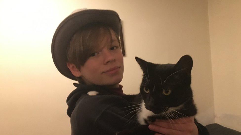 Daniel France holding a cat