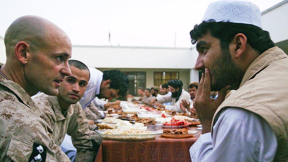 Mohammad Farim pictured with US Marine Lt Col Sean Riordan in 2011