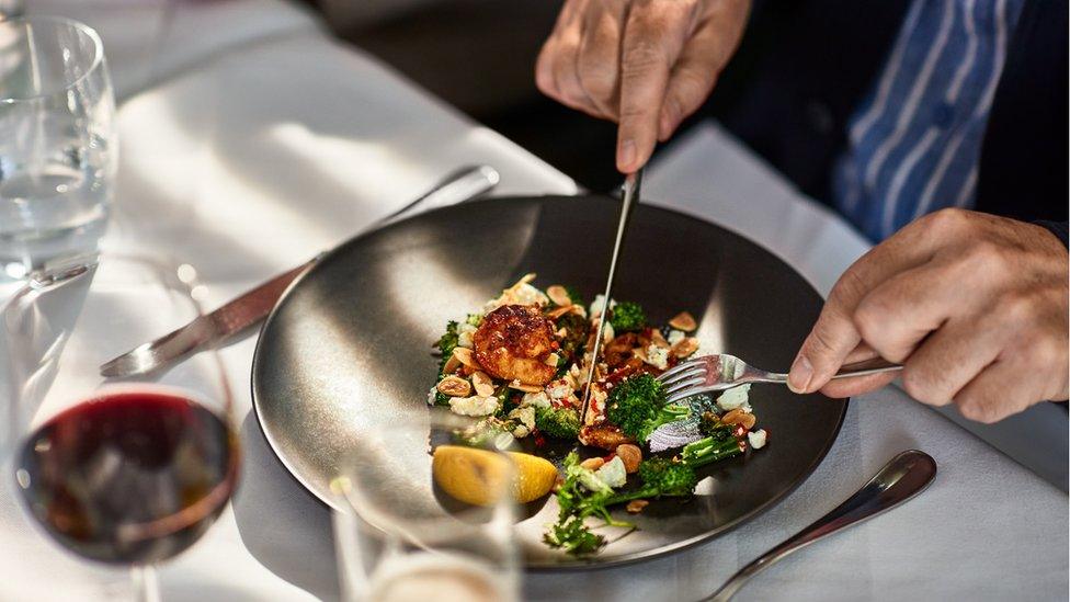 Man eating restaurant meal