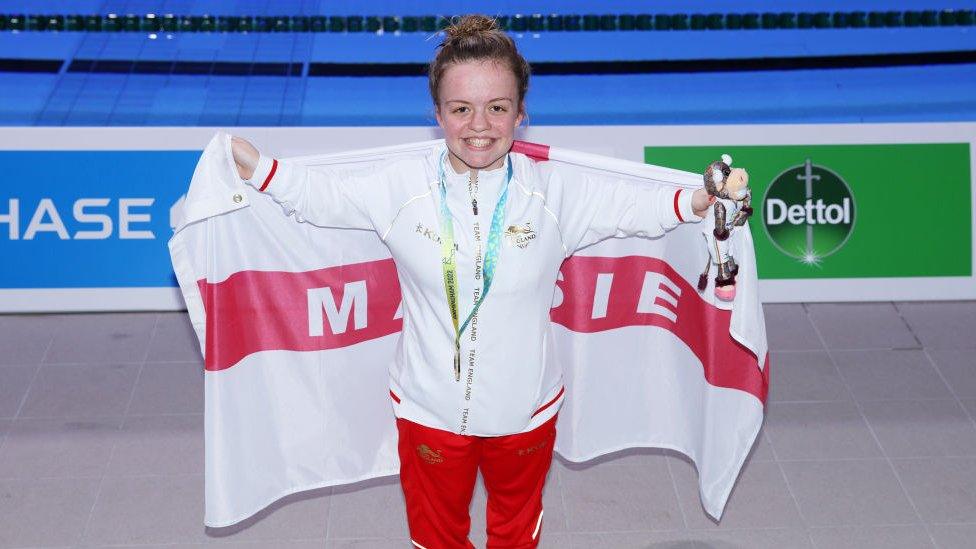 Gold medallist, Maisie Summers-Newton of Team England poses with their medal during the medal ceremony for the Women's 100m Breaststroke SB6 Final.