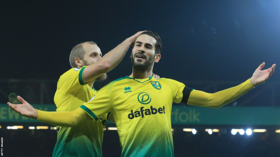 Mario Vrancic (centre) celebrates one of his two goals at Leeds in February 2019 with Teemu Pukki