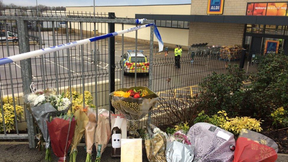 Floral tributes left at the scene