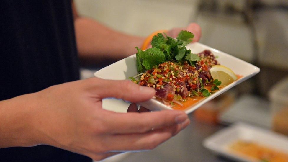 A dish of whale meat carpaccio, being served in a restaurant in Tokyo during the during Ebisu whale meat festival