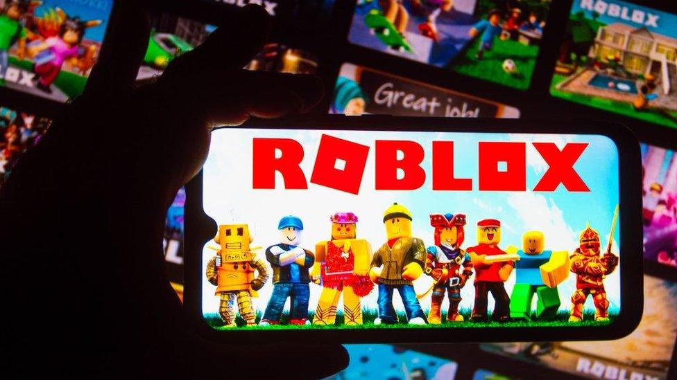 Roblox logo on a smart phone