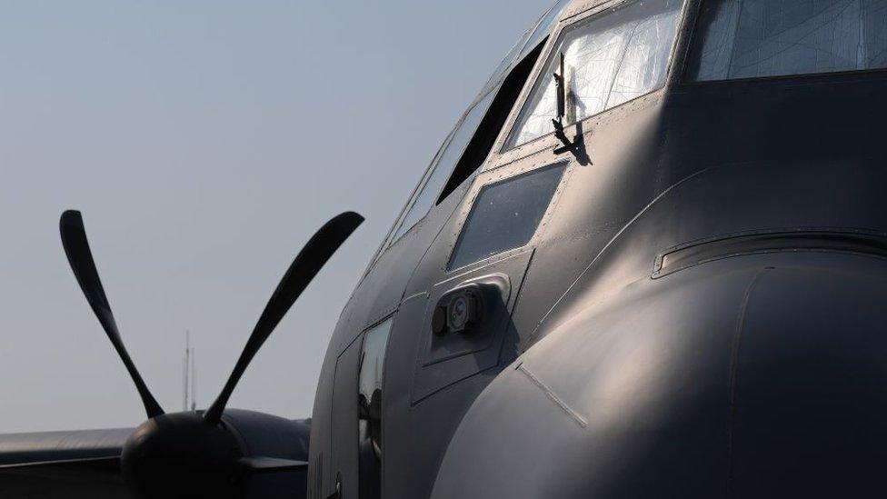 A US Air Force Lockheed Martin Super Hercules C-130J sits on the tarmac at the International Paris Air Show in Le Bourget outside Paris on June 21, 2017