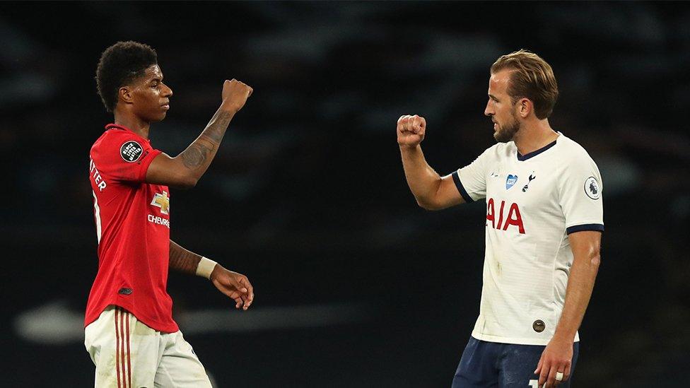 Marcus Rashford and Harry Kane fist bumping