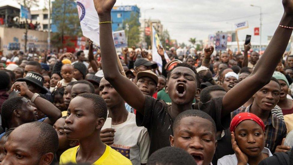 Supporters of Congolese Presidential candidate Martin Fayulu cheer him at an election campaign rally in Goma, North Kivu province, Democratic Republic of the Congo November 30, 2023