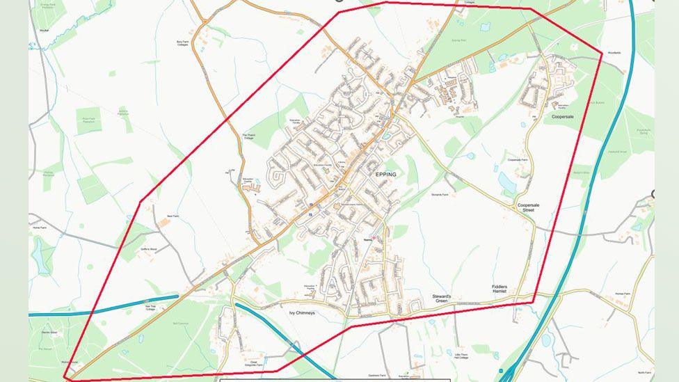 An map of Epping with a red line in a roughly diamond shape showing the extent of the police dispersal area around the town.