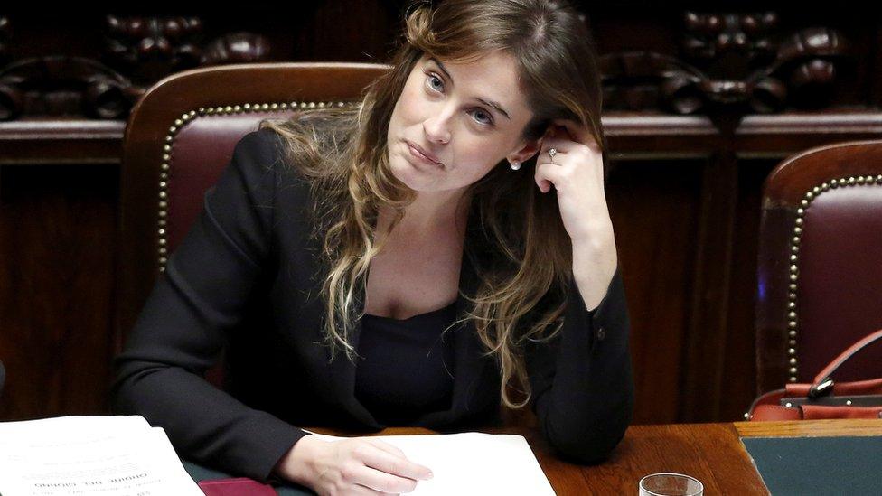 Italian minister Maria Elena Boschi listens to a parliamentary debate