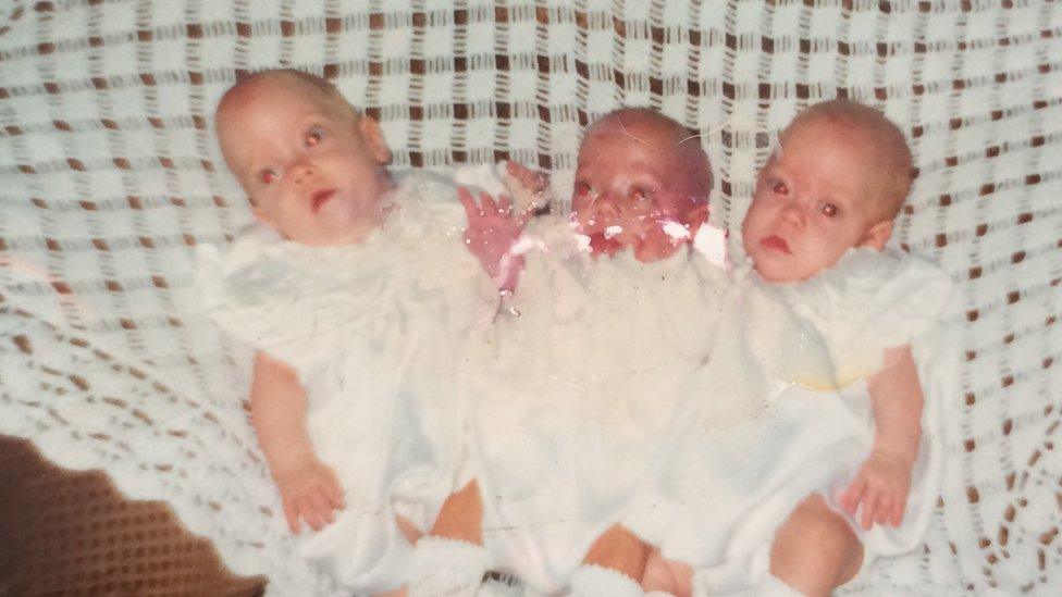 The triplets as babies