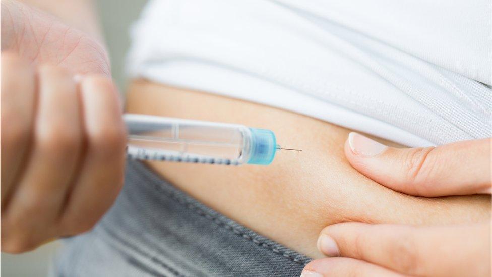 Diabetic injecting insulin