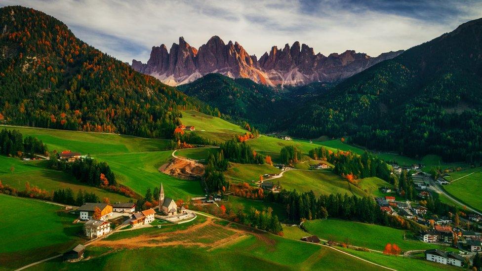 Village in front of mountains