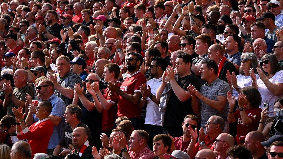 Liverpool fans applaud